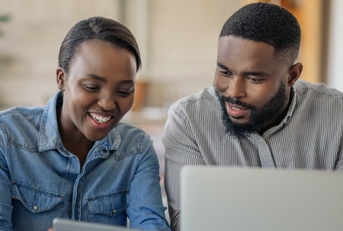 Couple looking at computer