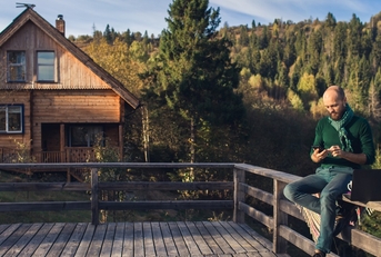 Remote worker at mountain cabin