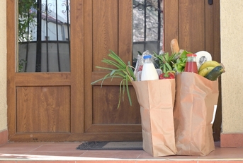 Bags of groceries outside front door