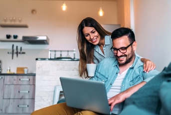 Couple looking at computer