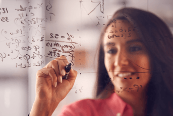 Mathematician working out a problem