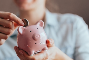 Saving in piggy bank