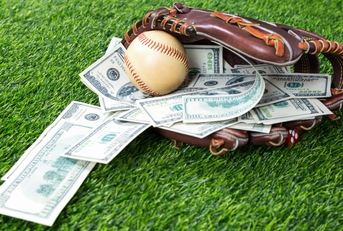 Baseball glove full of money