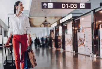 Woman walking through airport