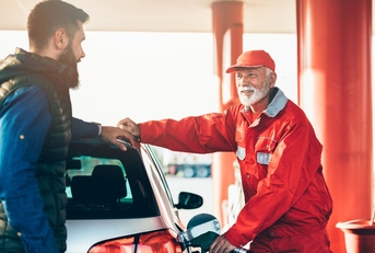  adult man together with senior worker