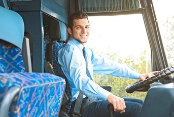Bus driver smiling