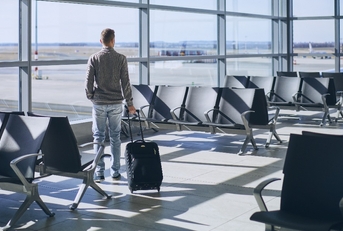 Traveler in airport terminal