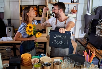 happy local coffee shop owners
