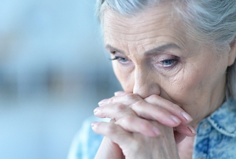 sad elderly woman