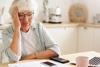 senior woman pensioner having depressed look
