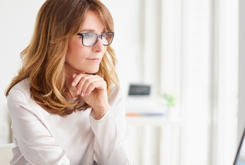 Woman looking at computer