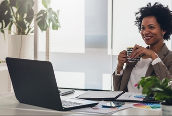 woman working on laptop at office