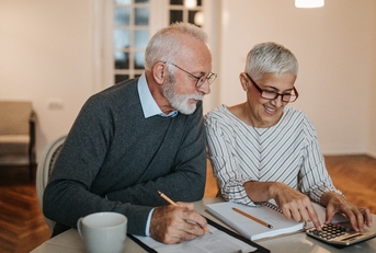 senior couple planning for a vacation