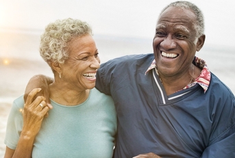 happy senior african american couple on the beach