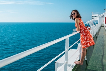 woman is sailing on a cruise ship