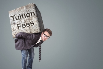 man carrying a heavy stone marked with tuition fees