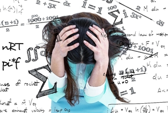 worried businesswoman holding her head