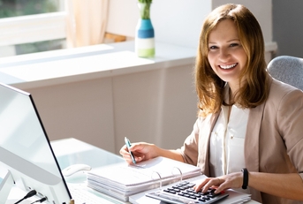 accountant woman in office doing accounting