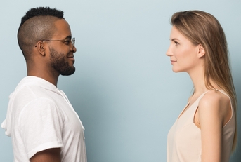 man and woman looking at each other