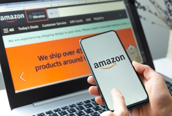buying goods in the Amazon online store using a smartphone and laptop