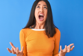 woman wearing orange t-shirt shouting