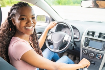 Young girl driving