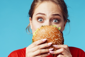 woman with hamburger
