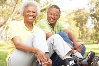 senior couple putting line skates