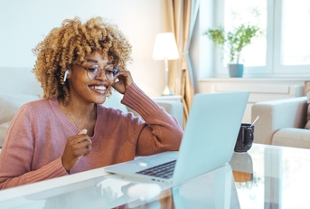 businesswoman in a video call using laptop 