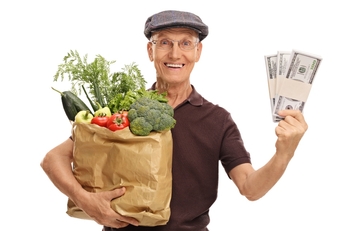 elderly man groceries and money
