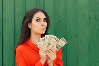 woman in red formal shirt holding money in hand 