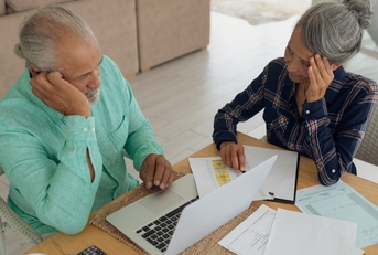 senior couple doing finances