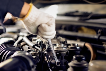 Mechanic working on car