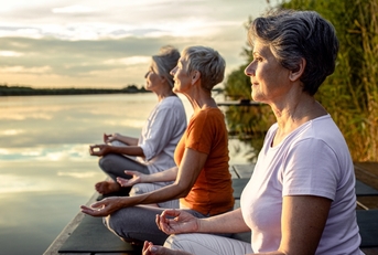 Older women doing yoga
