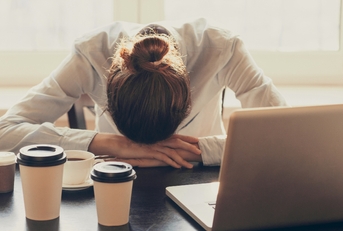 tired woman working at home 