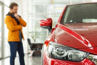 headlight of beautiful red automobile