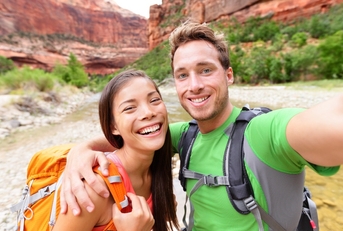 travel hiking selfie by happy couple on hike