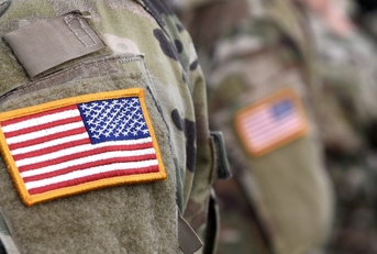 us military personals standing in queue 