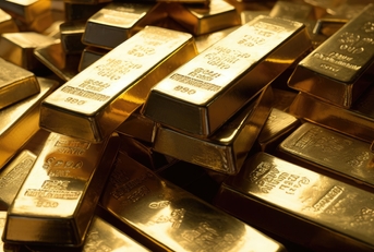 stacked of gold bars piling up
