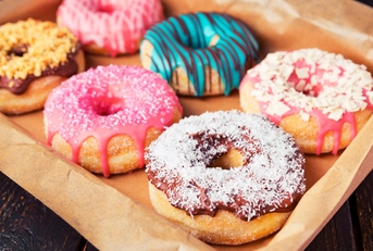 fresh homemade donuts with various toppings
