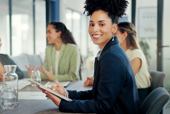 female worker working on digital technology