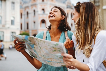 girls looking for direction in the city