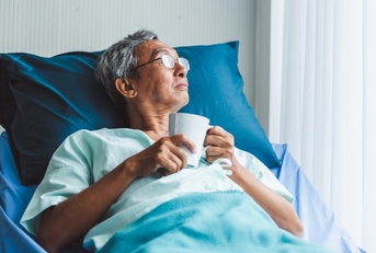 hospitalized patient looking out of window