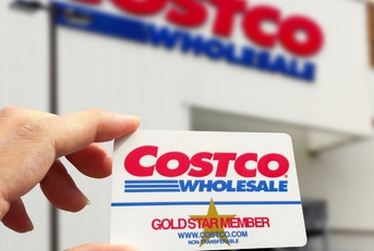 hand holding costco gold membership card