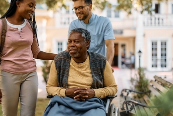 Woman visiting her elderly father at the nursing home