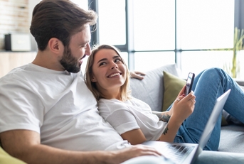 young couple relaxing on a couch