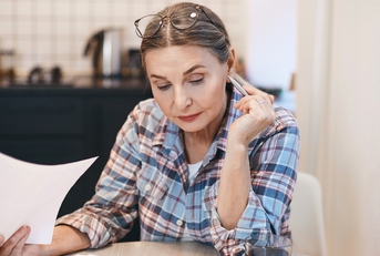 woman pensioner studying Spanish
