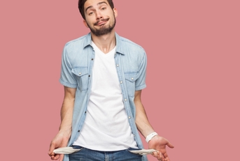 sad bankrupt bearded young man