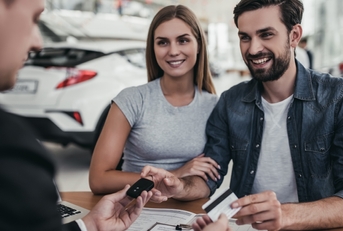 Couple buying a car