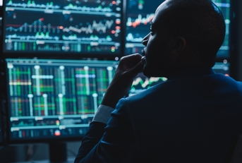 financial analyst working on computer